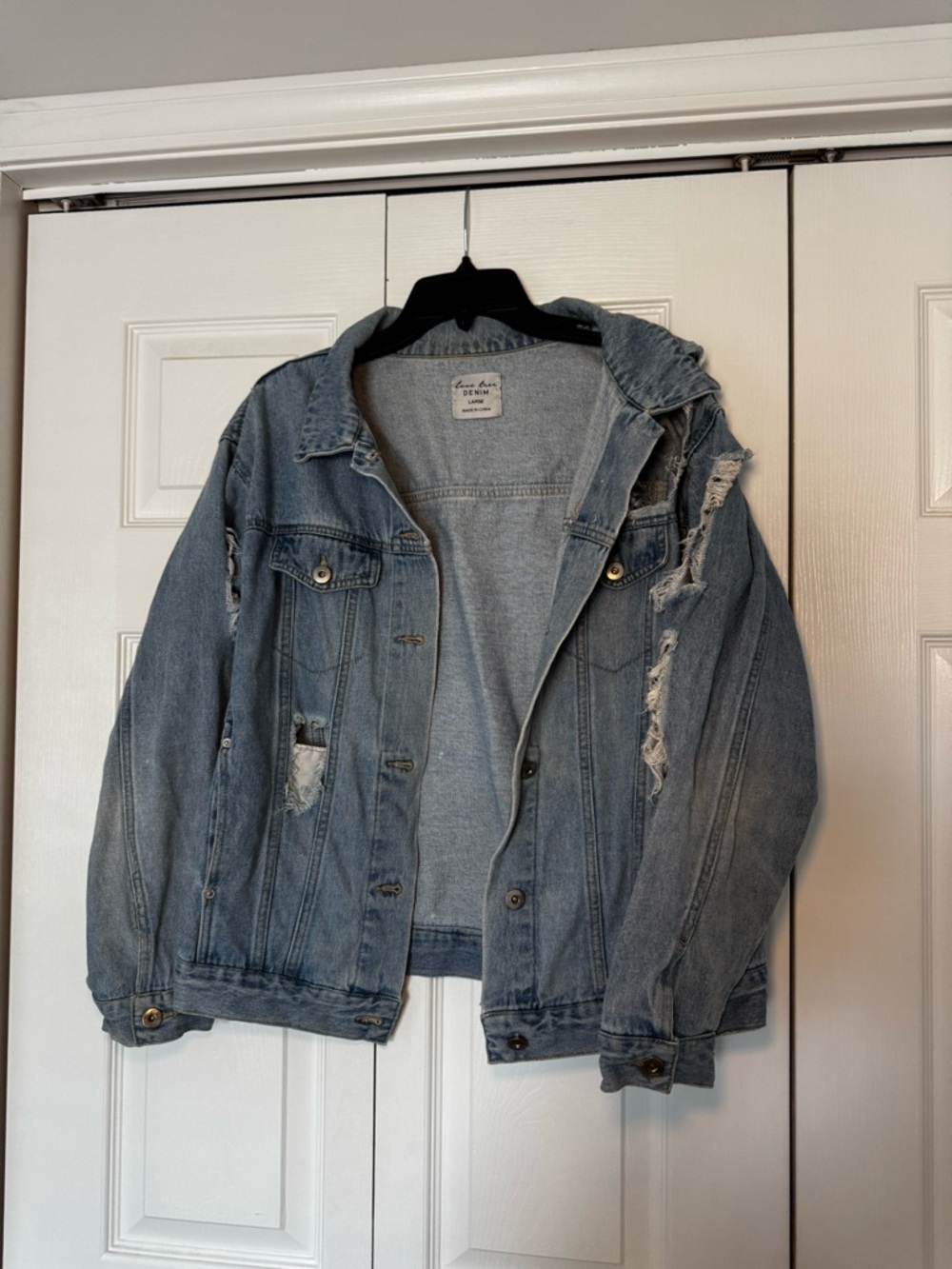 denim jacket with rips